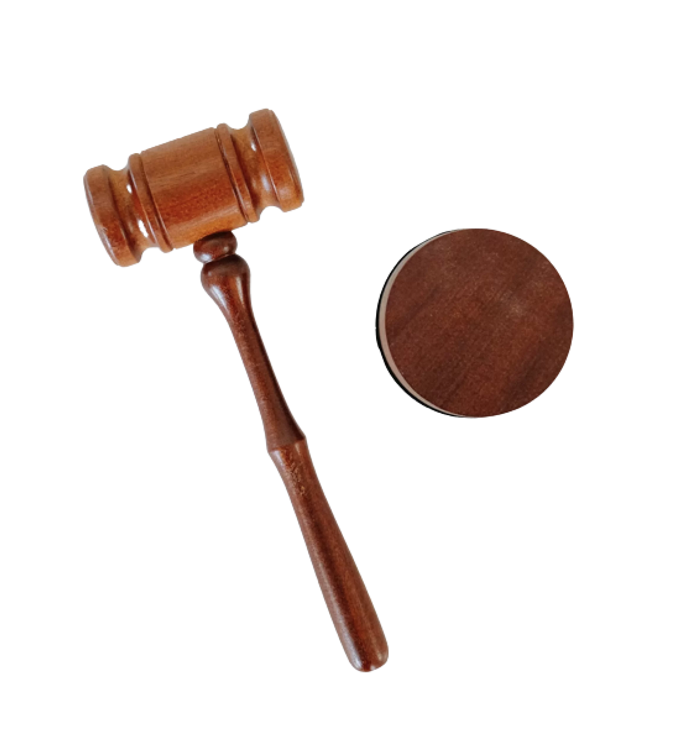 A wooden gavel and sound block on a black background.